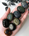 OBSIDIAN POCKET PEBBLE - black obsidian, emotional support, end of year sale, Friday the 13th, gold obsidian, gold sheen obsidian, grief gift bundle, holiday sale, mahogany obsidian, mercury rx, obsidian, pebble, platinum obsidian, pocket crystal, pocket stone, protection gift bundle, rainbow obsidian, recently added, silver sheen obsidian, spiderweb obsidian, tumble, tumbled, tumbled stone, velvet obsidian - The Mineral Maven